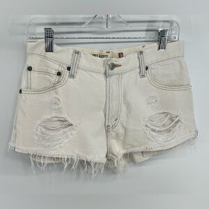 Levi’s white distressed cutoff denim shorts size 29